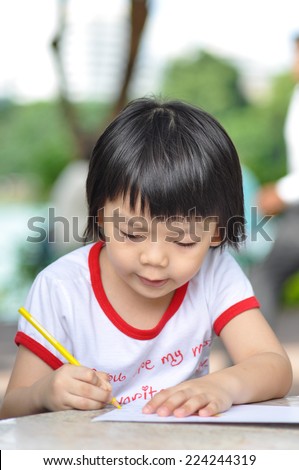 Young boy pay attention on drawing and coloring