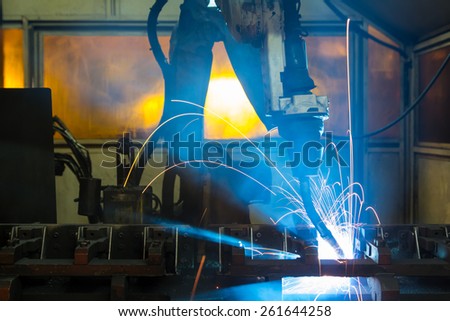 Industrial welder robotic in a car factory