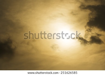 The Sun and dark cloud before sunset