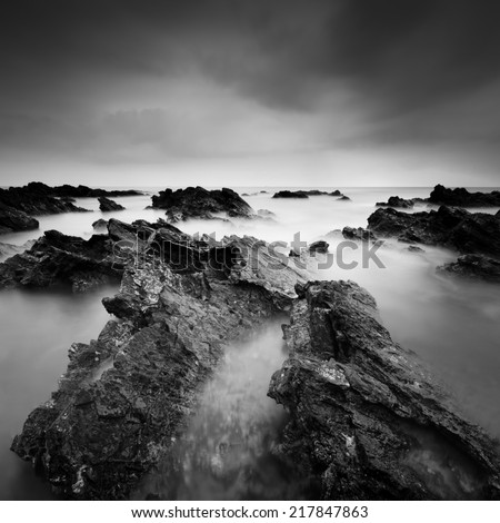 Long exposure ,black and white image of stone / rock. Image has grain or noise and soft focus when view at full resolution