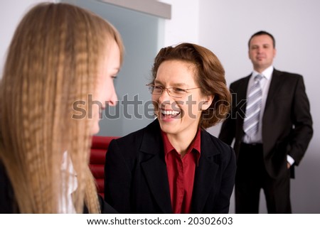 Middle Aged Manager at meeting