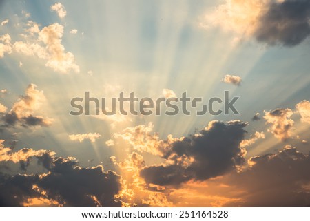 sunset sky with beam of light in evening
