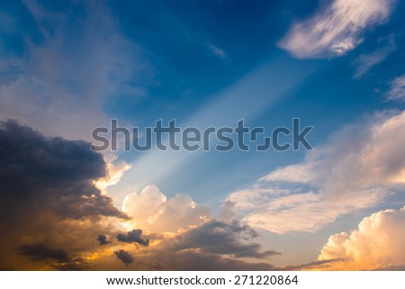clouds and sky with sun beam light, dark white and gold color of clouds in evening time
