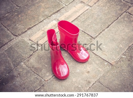 red color baby boots. garden boots for children , Vintage color tone