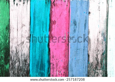 Colorful old grunge wooden background with vertical stripes. Vintage old backdrop. Vintage effect.