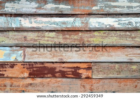 Colorful old grunge wooden background with horizontal stripes. Vintage old backdrop. Vintage effect.