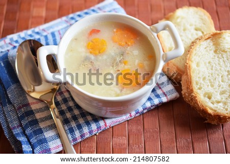 Fish soup in a white plate