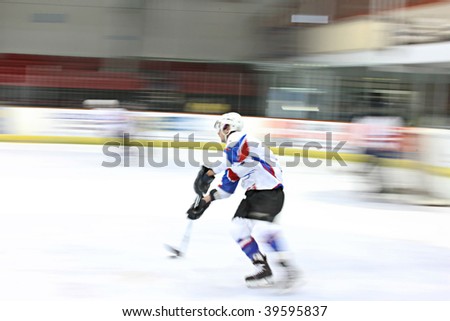Ice hockey player in motion on the ice