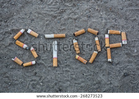 STOP words  by cigarette background in World No Tobacco Day