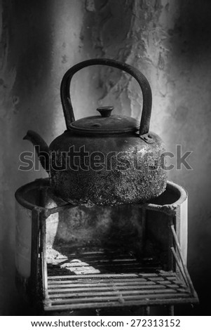 old kettle for boiling water on stove ,Black and white tone