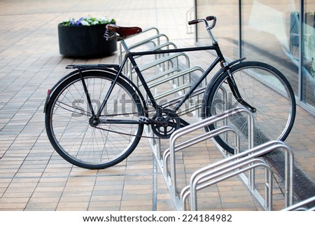 Locked bicycle at bicycle parking