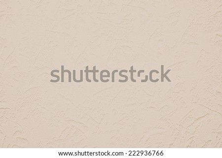 Wallpaper with light decorative texture for building repair decoration interiors. Beige coffee with milk color. Minimalism style