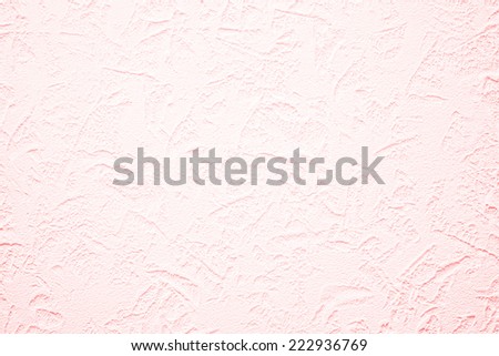 Wallpaper with light decorative texture for building repair decoration interiors. Pink coral cream pastel color. Minimalism style