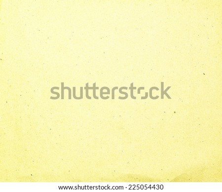 Craft eco textured paper sheet background beige color for cards and other design ideas bright yellow color