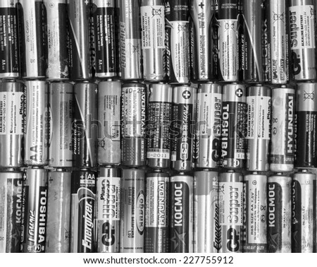 KIROV, RUSSIA - NOVEMBER 02, 2014: Different types of used batteries ready for recycling lying in the table on November 02, 2013 in Kirov, Russia. Type is AA
