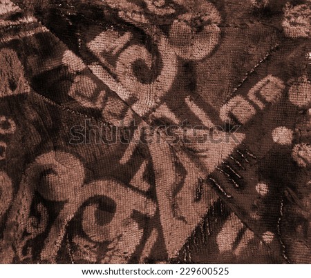 Velvet velor cloth background with abstract ornament. Background for theater and fashion design themes.