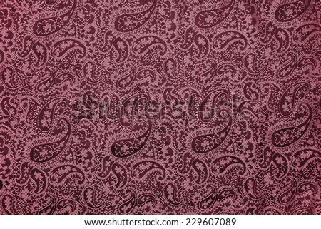 Indian floral pattern with cucumbers on a natural silk cloth. Background for oriental design style