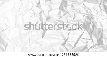 Eco craft crumpled paper background and sheet of white paper on it for identity, cards and scrapbooking gray color