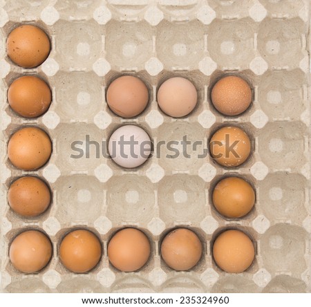 Eggs in a beige paper ecological cell container in a shape of curl. Food packaging