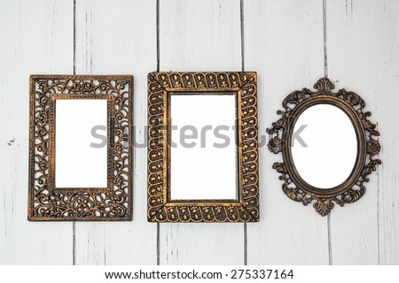 Vintage Shabby chic photo frame set with oval and rectangular frames for wedding bridal photo on a white wooden background