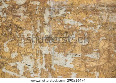 Grunge white background with cracks and grain. Brick wall with the whitewash falling off fragment as a background texture