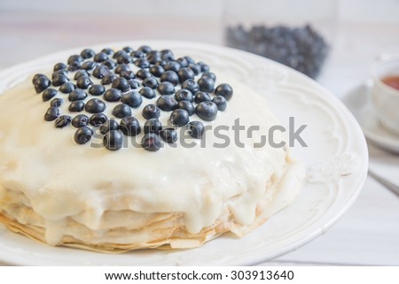 Pancake pie with cheese creme and blueberry. Photo for recipe or food blog