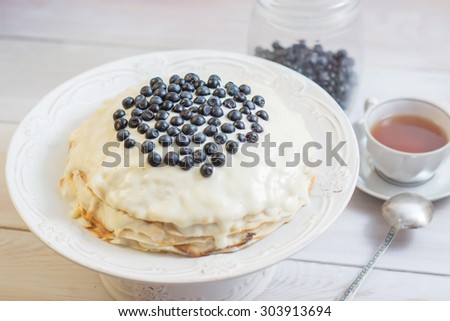 Pancake pie with cheese creme and blueberry. Photo for recipe or food blog