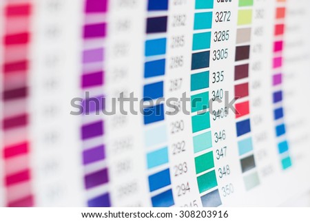 Paper sheet with printed  table of color swatches with their numbers