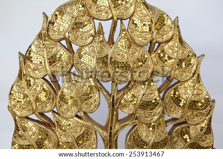 Wood carvings, gold color, white background.
