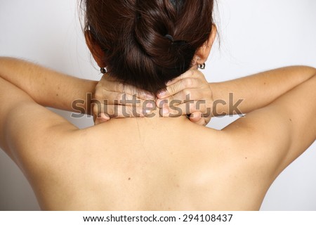 Woman having pain in the back and neck,Pain in the back