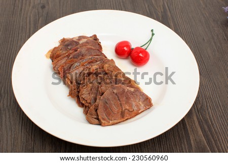 Spicy Beef Jerky on vintage wooden background