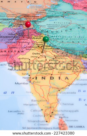 A map with a red map pin placed at Islamabad, Pakistan and a green map pin in Delhi, India.
