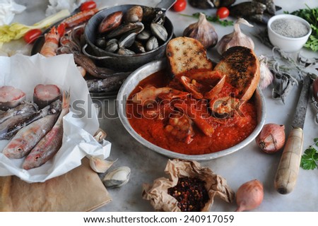 Fish soup. Cacciucco: Italian Tuscany fish soup. Traditional Livorno poor fishermen\'s soup.
