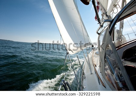 Sailboat heeling on a sunny day
