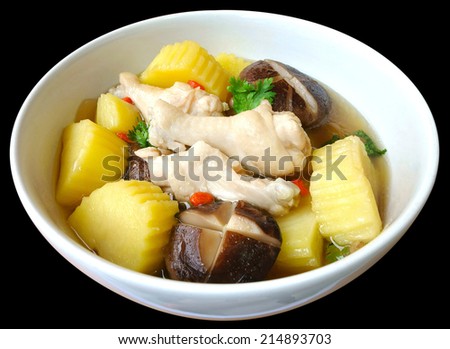 Chinese medicine and chicken soup with potatoes.,