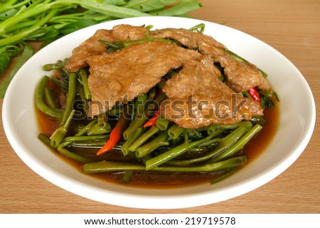 Quick fried water spinach with chili soy sauce and pork.