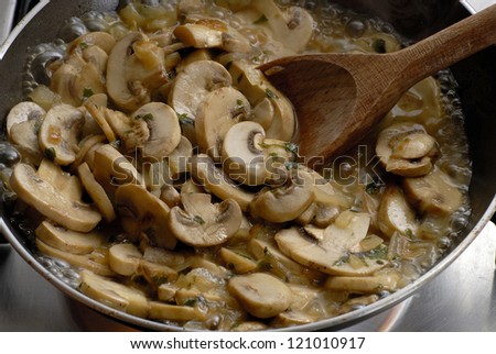 Cooking mushroom on a pan.Cooking fungus.