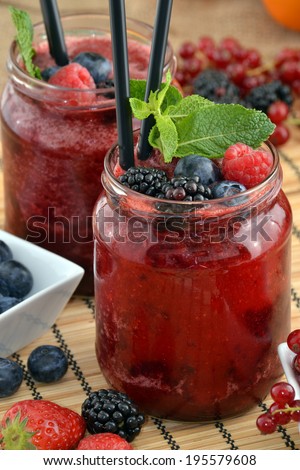 Blackberry cocktail drinks and fruits.Forest fruit drinks.