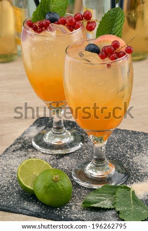 Peach orange cocktail drinks and lemon.Fruzzy lemon cocktail drinks.