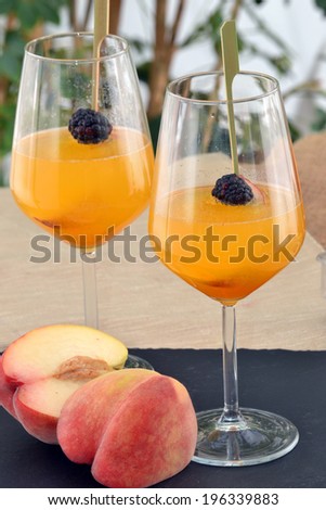 Cocktail drinks peach flavor.