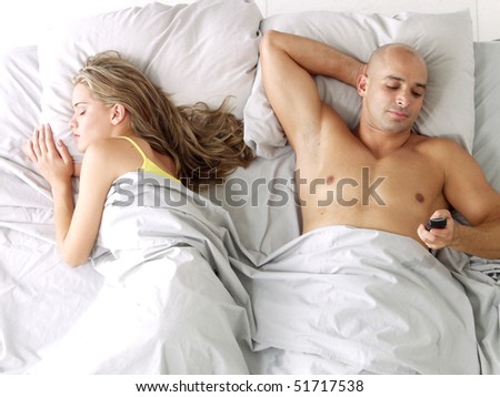 stock photo : Latin american couple on bed.