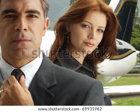 Business people before boarding a private jet.
