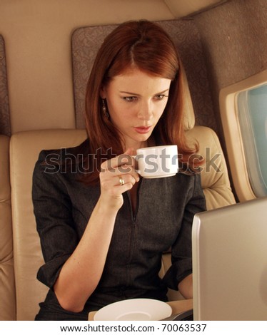 Businesswoman on a private plane.