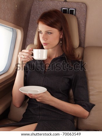 Businesswoman on a private plane.
