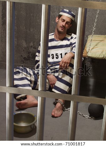 Prisoner in a prison cell.