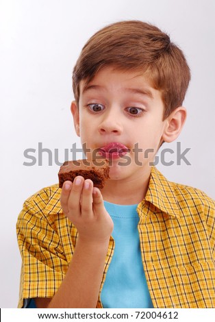 fat kid eating cake. fat kid eating cake.