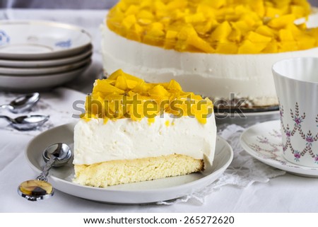 cheese cake with yogurt and peaches on a white background