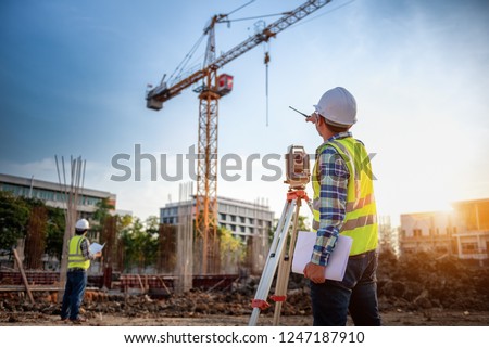 Surveyor equipment. Surveyor’s telescope at construction site or Surveying for making contour plans is a graphical representation of the lay of the land startup construction work.