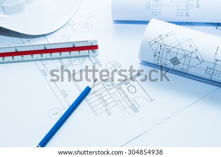 Construction and architecture drawings paper blueprints.