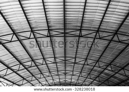 Corrugated metal roof for storage or warehouse. Insulation under roof protection surface heat.